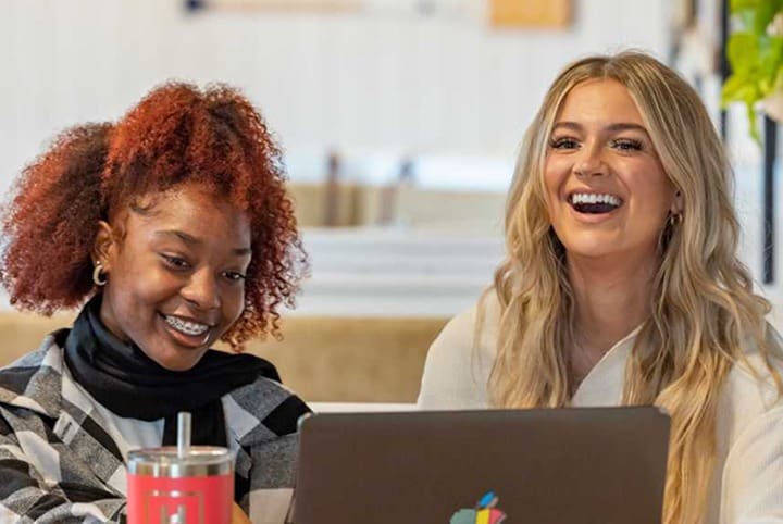 two women laughing