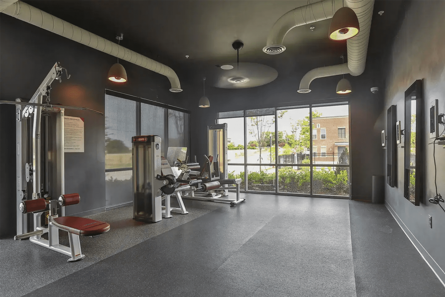 Student apartment gym with different types of training equipment